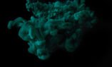 abstract dark texture with green splash of paint